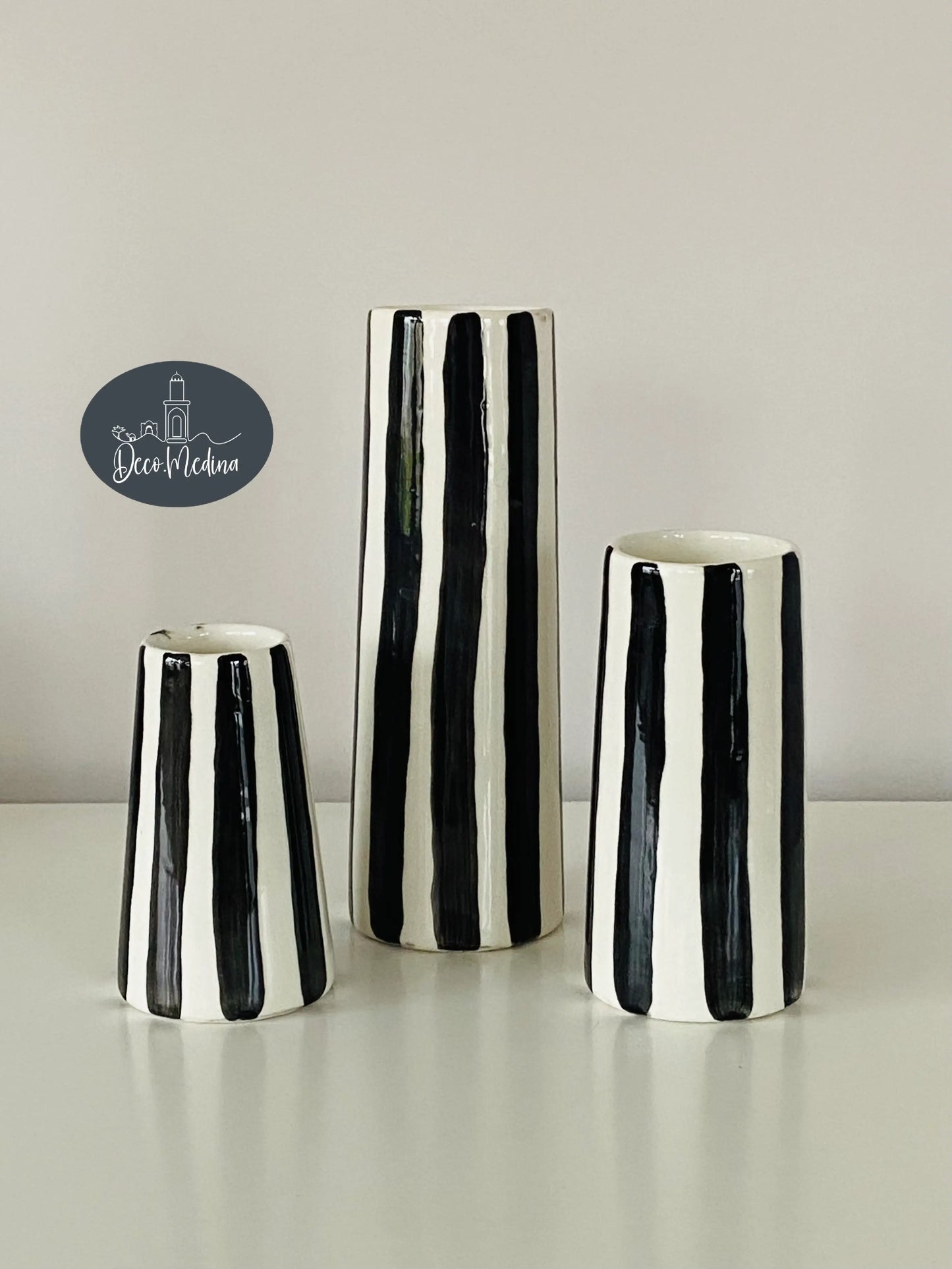 Trio de vases en céramique rayés