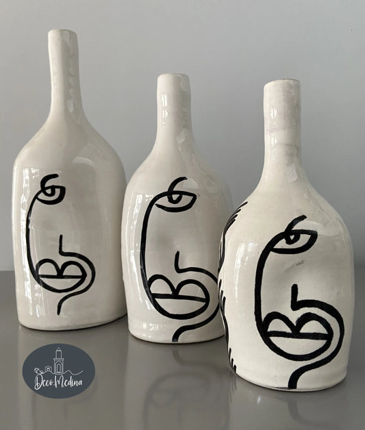 Trio de vases motif visage